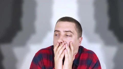 The man is experiencing a panic attack. The concept of phobia, fears, paranoia a Video stock 154636842