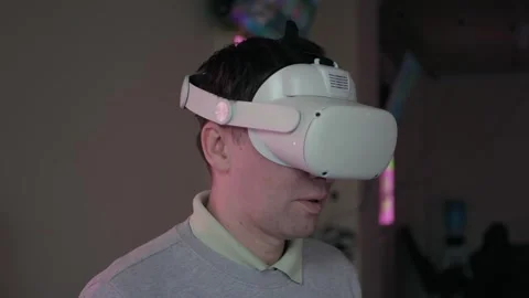 Man Experiencing Virtual Reality Headset Stock Footage 266326944