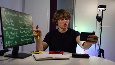 Man explaining an AI implant process while gesturing with cutters Stock Footage 323271056