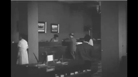 A man explains all the good things a bank does for its community Stock Footage 116257712