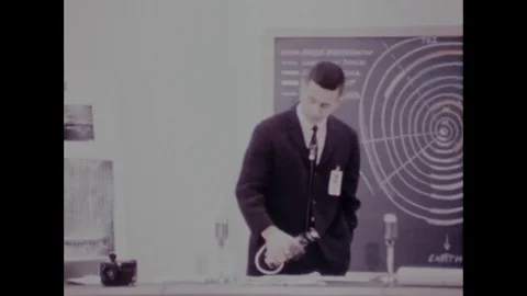 Man explains a diagram of orbit before the launch of Apollo 8 - 1968 Stock Footage 94340846