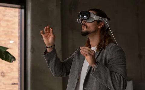 A man explores the potential of spatial computing with an AR headset Fotos Stock