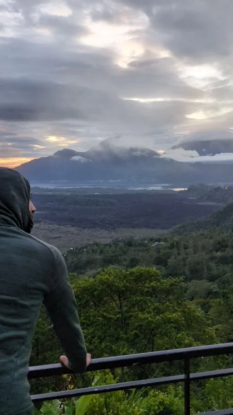Man exploring Mount Batur in Kintamani Bali Indonesia Stockbeeldmateriaal 332407196