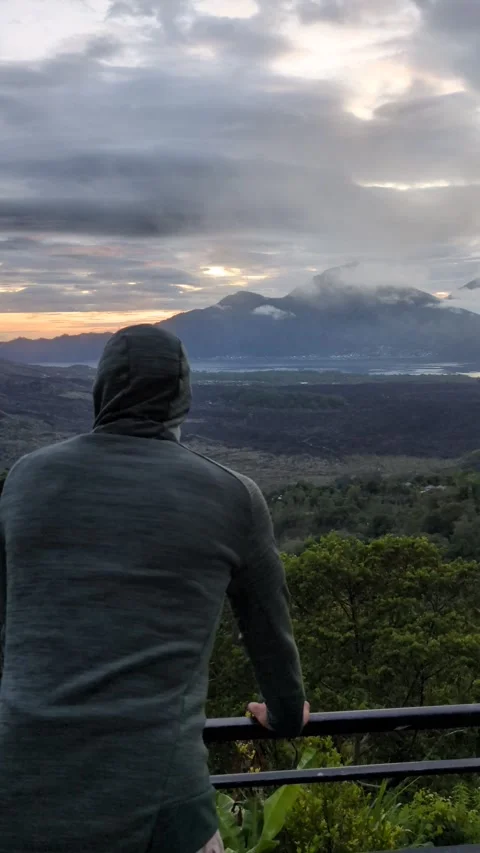 Man exploring Mount Batur in Kintamani Bali Indonesia Stock Footage 332407199