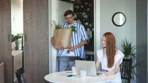 Man expresses dissatisfaction, he does all the chores while his wife works Stock Footage 137695494