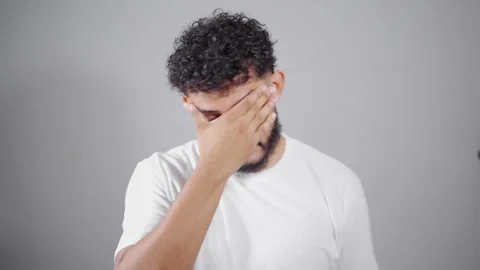 Man expressing various emotions, touching face with hands Stock Footage 315051577