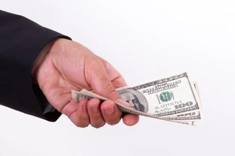 Man extends money Stock Photos