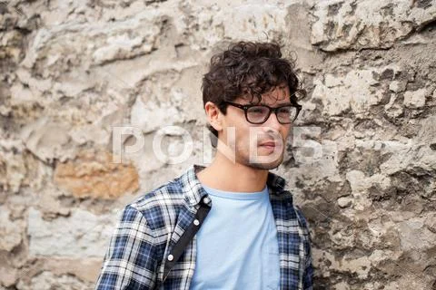 Man in eyeglasses on city street Stock Photos