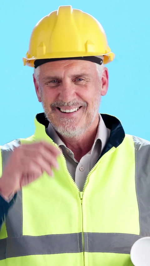 Man, face and architect in studio with hardhat, safety protocol or compliance Stock Footage 340612894