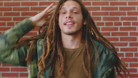 Man, face and student with dreadlocks for fashion, style or development on a Stock Footage 334759613