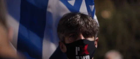 A man in face mask protesting Stock Footage 152847786