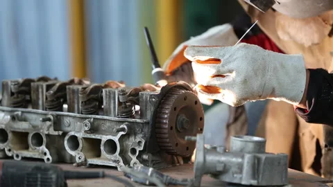 The man in the face mask is welded by argon welding. Welder industrial work.. 스톡 동영상 336937065