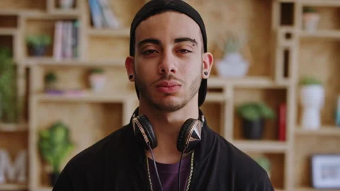 Man, face or student with headphones for creative scholarship or academic Stock Footage 334699211