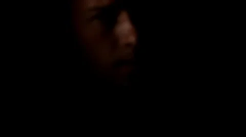 Man face silhouette in dark Stock Footage 8841356