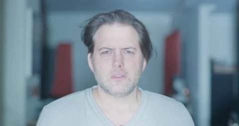 Man Face standing at door of ghostly alien abduction silhouette wind lights Stock Footage 249299227