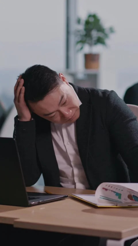 A man faces challenges at work, reflects, and seeks solutions Stock Footage 313791529