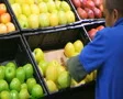 Man Facing Apples In Produce 02 SD Footage