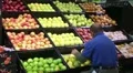 Man Facing Apples In Produce 03 HD Footage