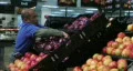Man Facing Apples In Produce HD Footage