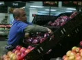 Man Facing Apples In Produce Footage