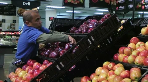 Man Facing Apples In Produce Stock Footage 8579722