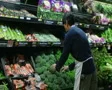 Man Facing Broccoli In Produce SD Footage