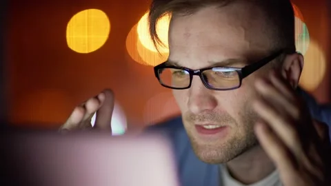 Man facing problem while working on laptop Stock Footage 131537606