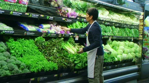 Man Facing Vegetables In Produce Stock Footage 355386