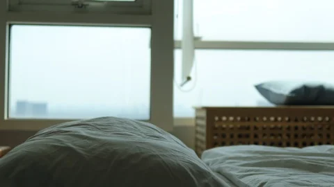 Man fall down to bed as he is out of energy. Stock Footage 126307228