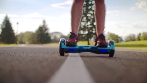 Man fall from self balance hoverboard. Man crash on electric gyro scooter Stockbeeldmateriaal 73531537