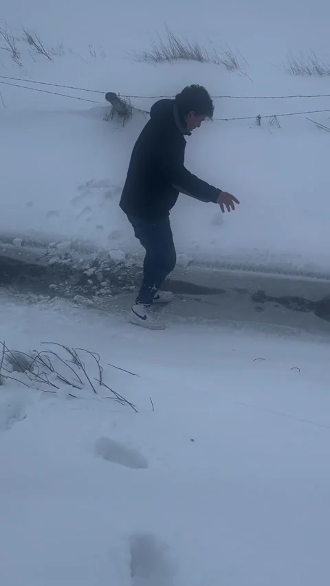Man Fall Through Ice on Frozen Stream, Roccaraso, L'Aquila, Italy - 16 Jan 2025 Stock Footage 302286690