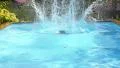Man Falling and Splashing into Pool Water. Slow Motion. HD Footage