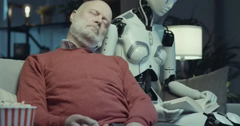 Man falling asleep next to his AI robot Stock Footage 297790819