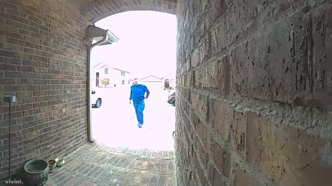 Man Falls on Black Ice Outside His Door, Burleson, Texas, USA - 22 Feb 2022 Stock Footage 323214083