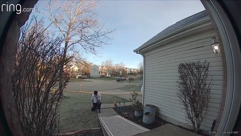 Man Falls Flat on Back Down Slippery Ramp, Milford, Ohio, USA - 26 Jan 2022 Stock Footage 234201512