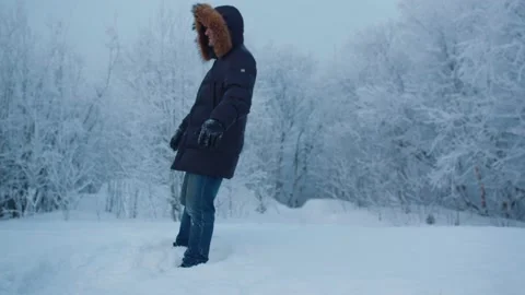 Man falls on his back in the winter forest Stockbeeldmateriaal 179994210