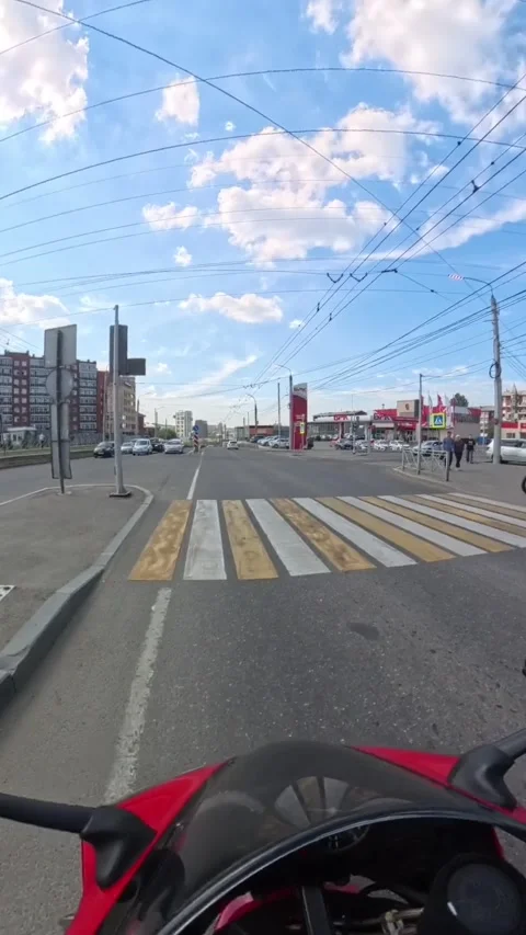 Man Falls Off Motorcycle at an Intersection, Irkutsk, Russia - 02 Jul 2026 Stock Footage 340170548
