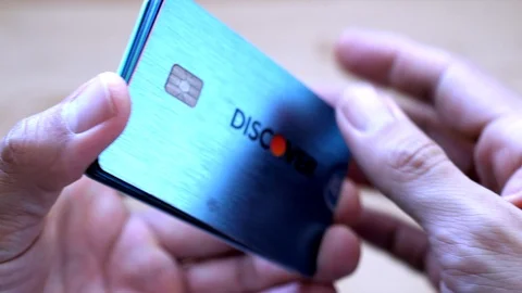 Man fanning out a stack of credit cards and IDs Video stock 101869185