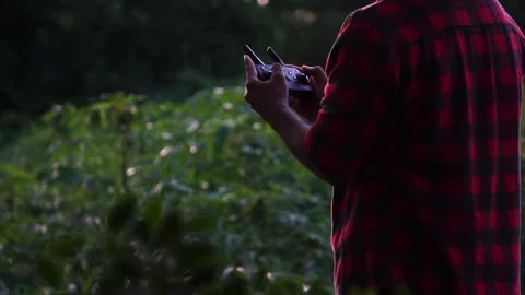 Man Farmer Pilot Using Drone Controller Stock Footage 247197847