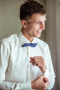 Man fastening a cuff Stock Photos