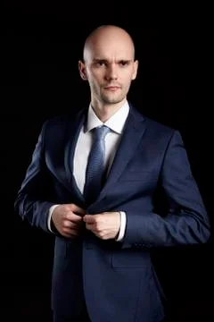 Man Fastens his Jacket Stock Photos