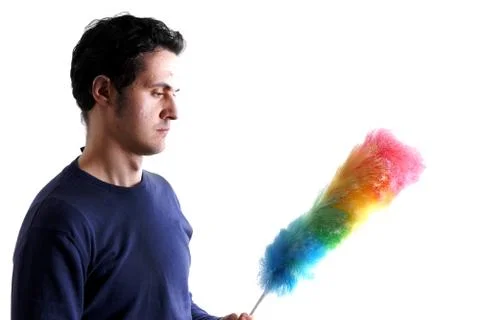 Man with feather duster Stock Photos