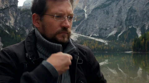 Man feeling cold in the mountain Stock Footage 45454732