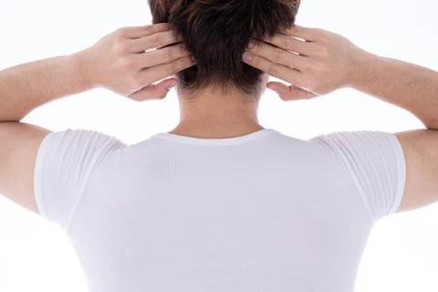 A man feeling exhausted and suffering from neck and head pain and injury on i Stock Photos