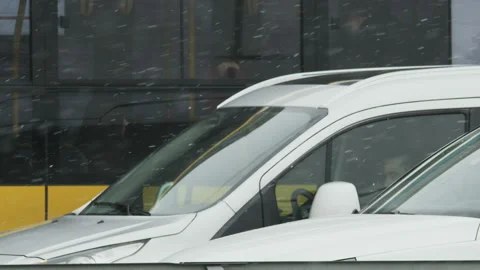 Man Feeling Sleepy in his White Car. Snowfall Stock Footage 87866816