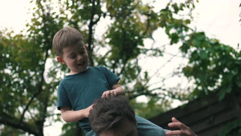 Man felt back pain playing with his son Stock Footage 160948088