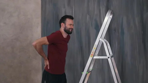 Man felt back pain while working home Stock Footage 145698969