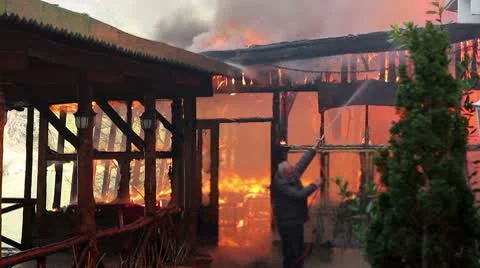Man fighting the fire Stock Footage