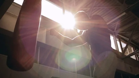 Man fighting in sunlight 스톡 동영상 77876986