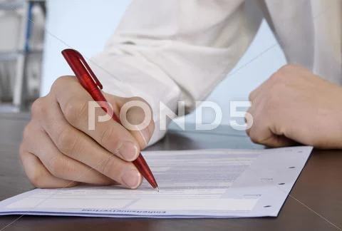 Man Filling In Application Form, Close-Up